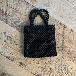 Vintage beaded The Sak black evening bag